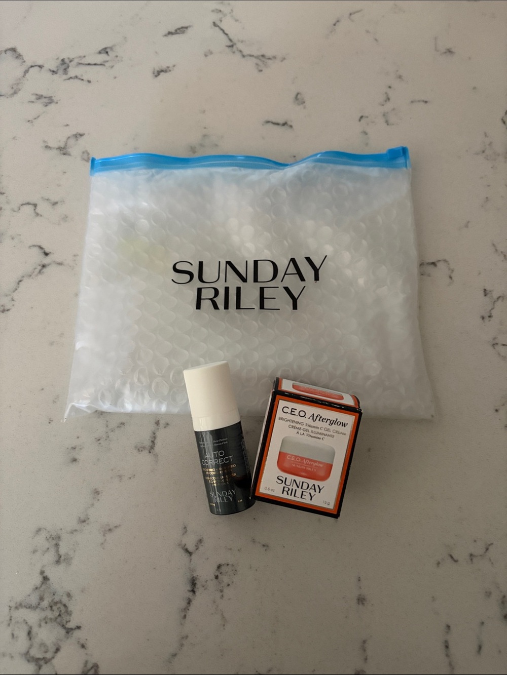Sunday Riley set, ceo afterglow and autocorrect new with reusable pouch